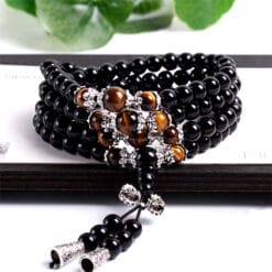 Bracelet Mala 108 Perles en Obsidienne Noire et Oeil de Tigre pour la méditation avec clochettes